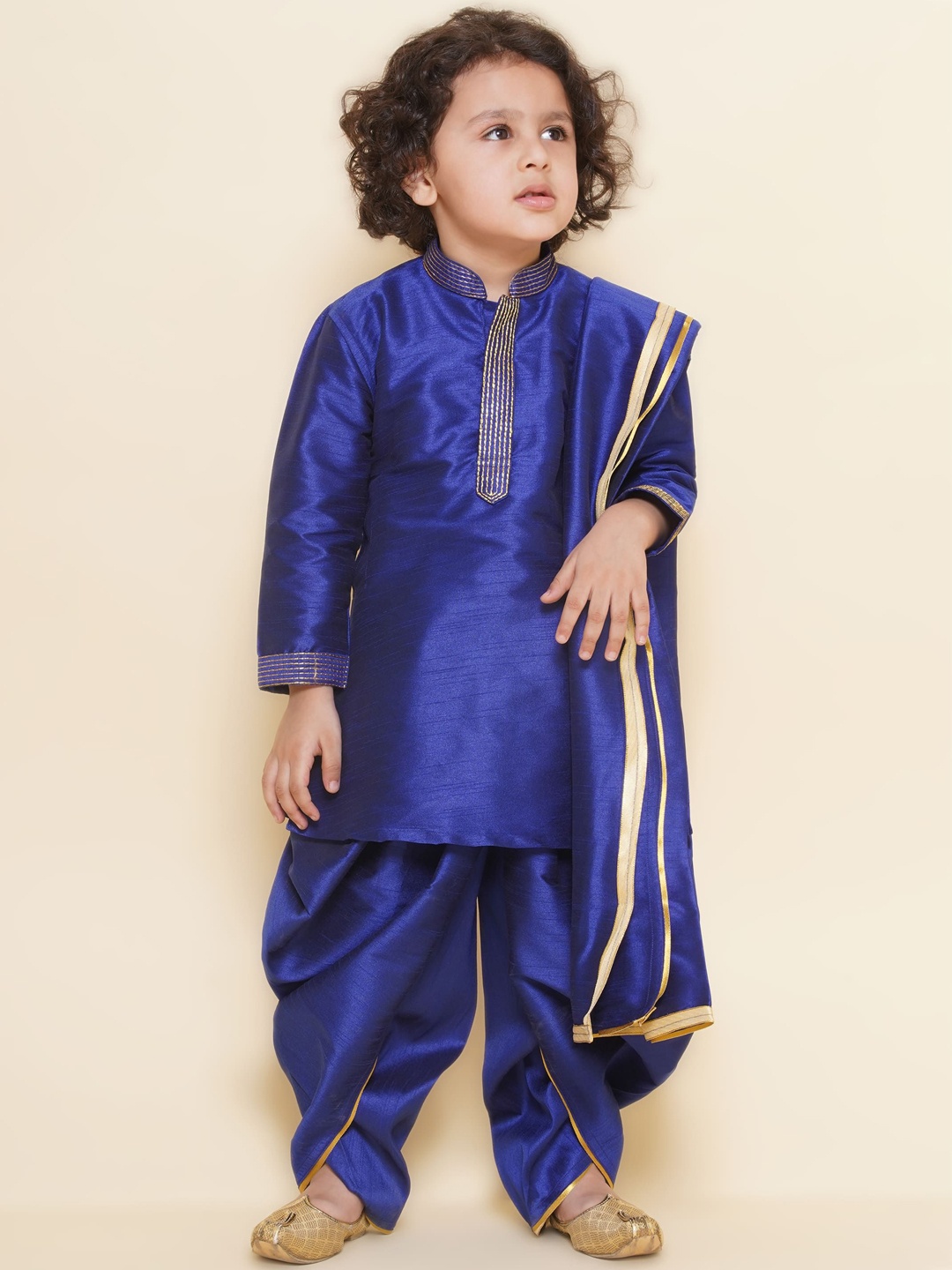 

Sethukrishna Boys Mandarin Collar Dupion Silk Straight Kurta With Dhoti & Angavastram, Blue