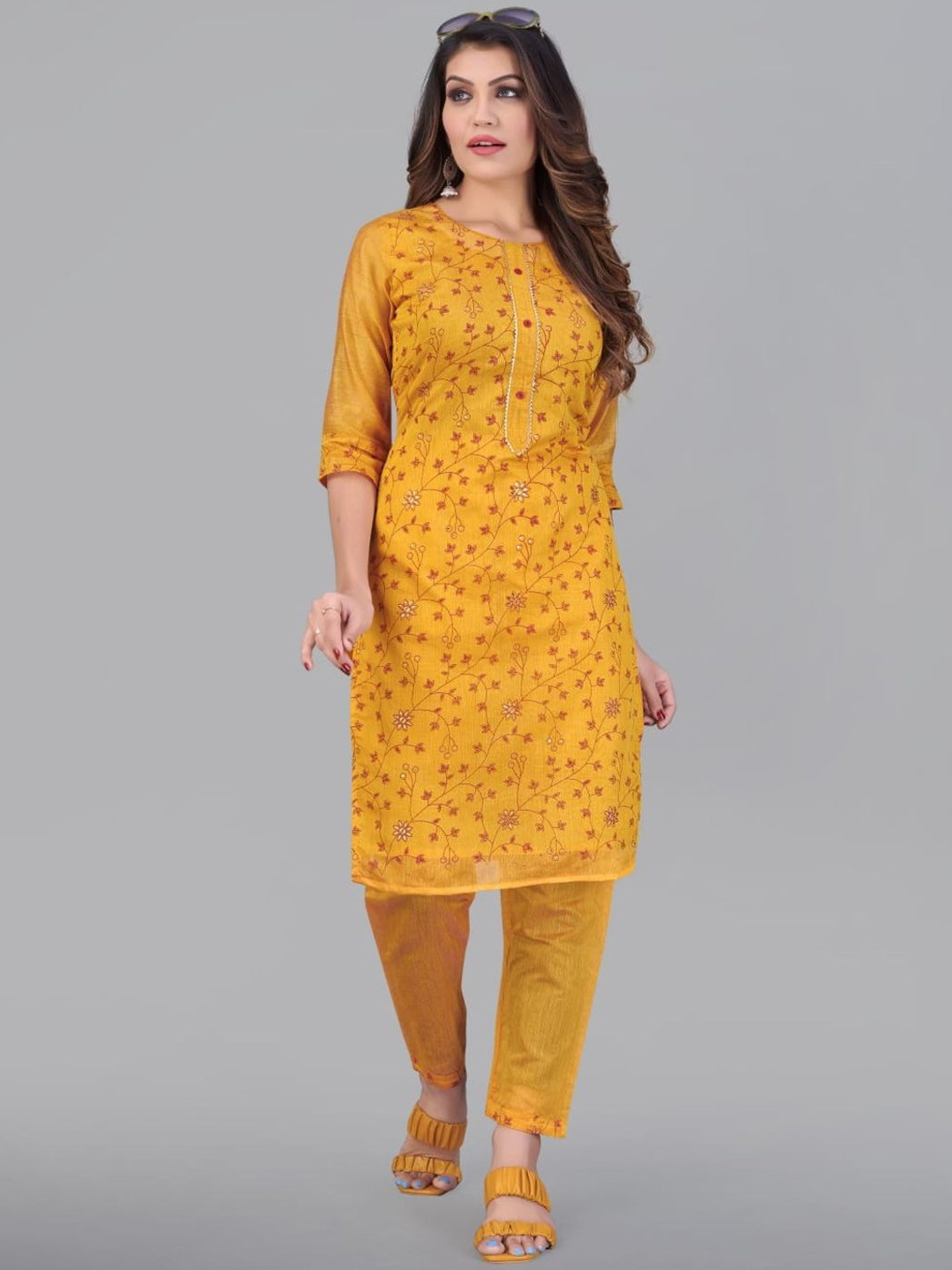 

Rujave Floral Printed Round Neck Sequinned Chanderi silk Straight Kurta with Trousers, Orange