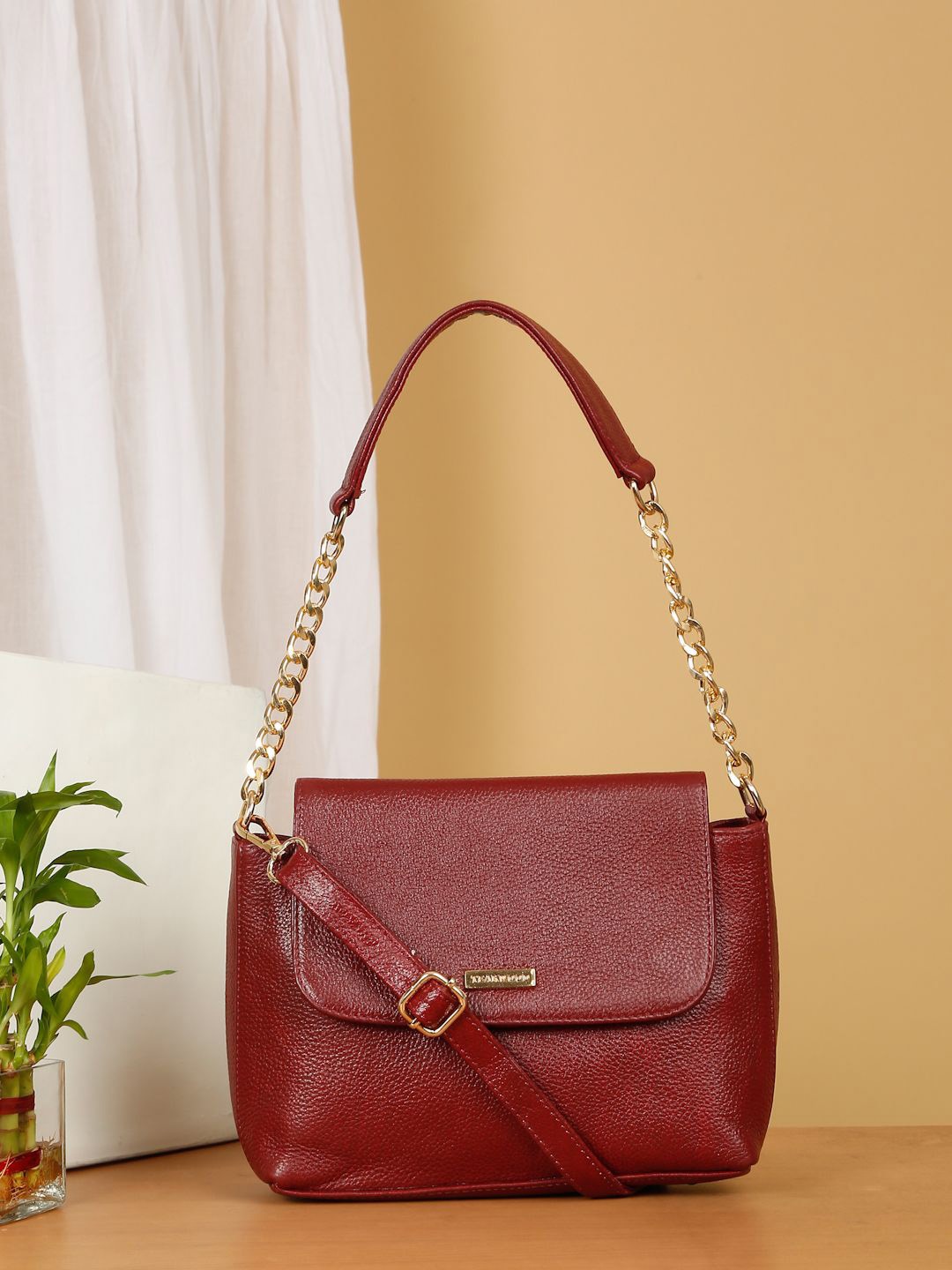 

Teakwood Leathers Structured Handheld Bag with Cut Work, Red