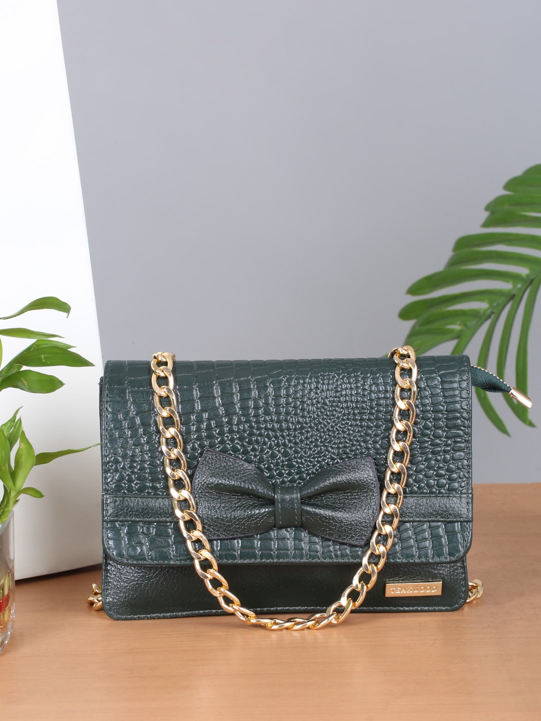 

Teakwood Leathers Small Structured Sling Bag with Bow Detail, Green
