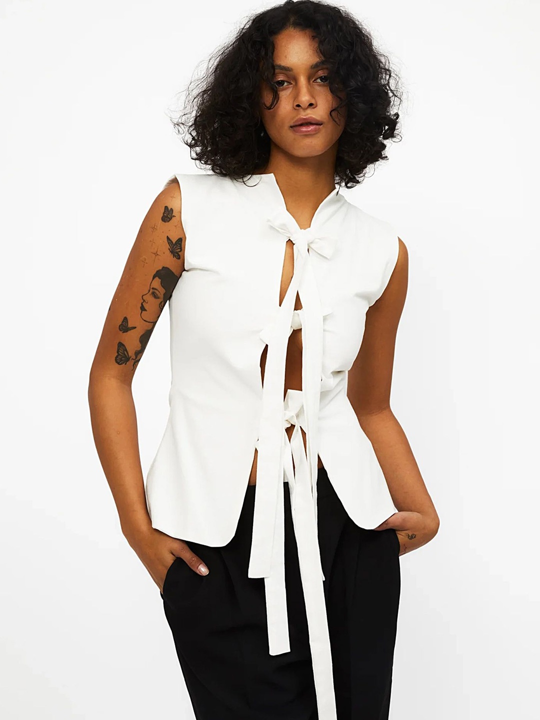 

LULU & SKY White Sleeveless Tie-Up Neck Top