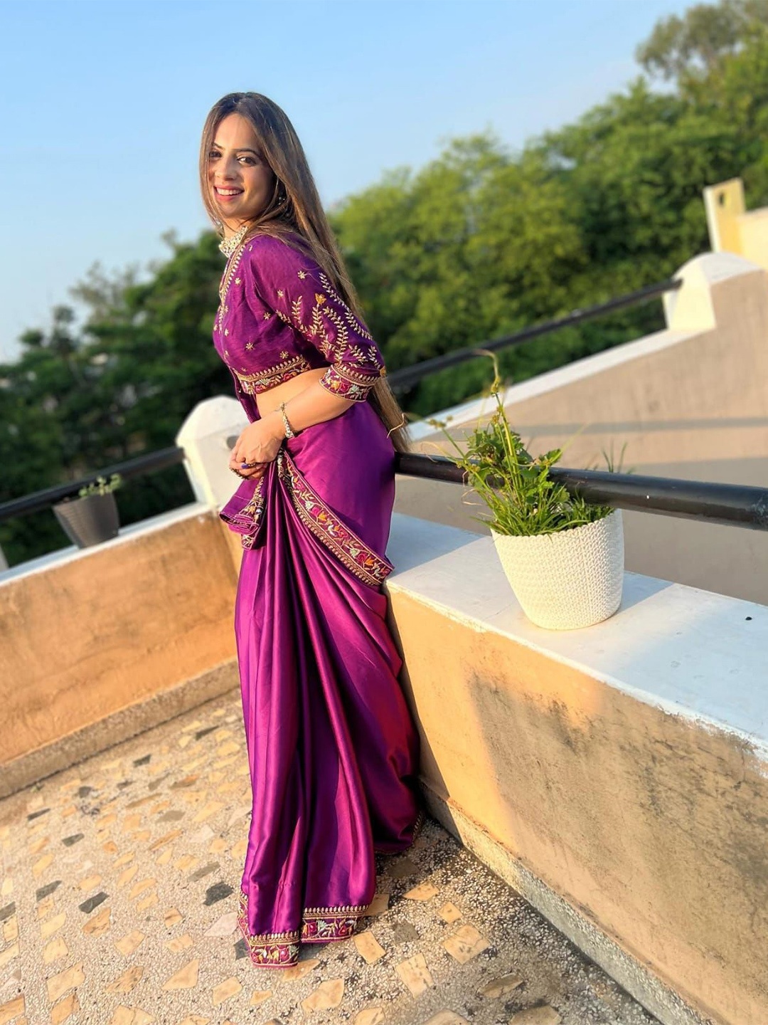 

Celeb Styles Solid Embroidered Saree, Purple