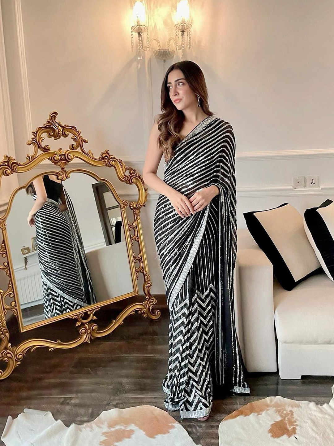 

Celeb Styles Embellished Sequinned Pure Georgette Saree, Black