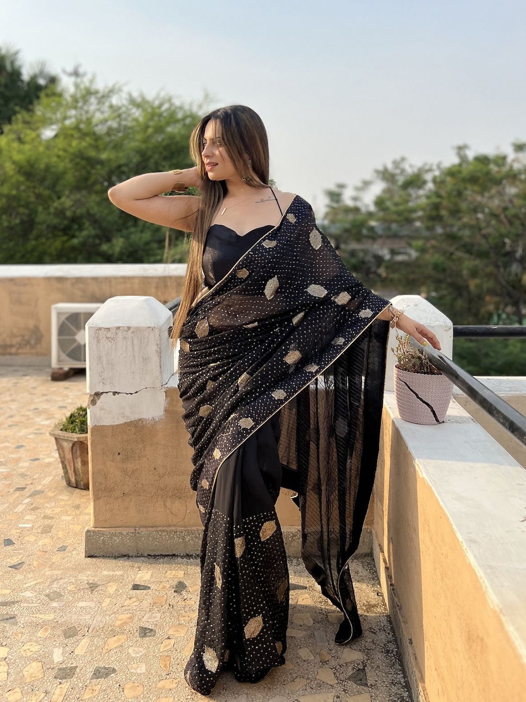 

Celeb Styles Embellished Embroidered Pure Georgette Saree, Black