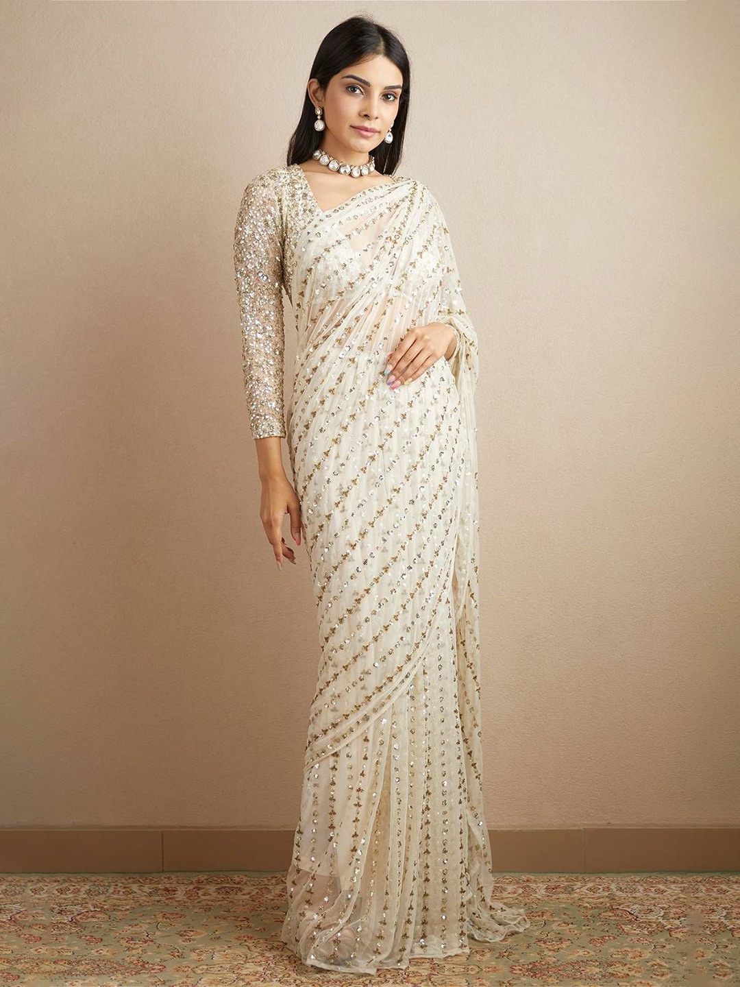 

Celeb Styles Ethnic Motifs Sequinned Pure Georgette Saree, White