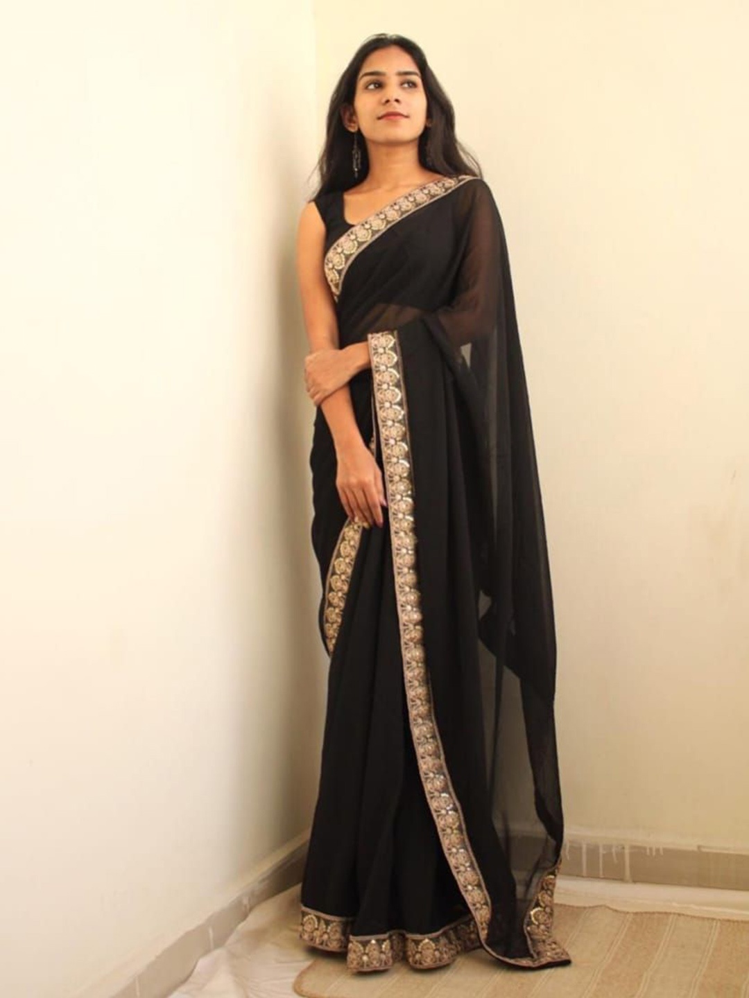 

Celeb Styles Sequinned Pure Georgette Saree, Black