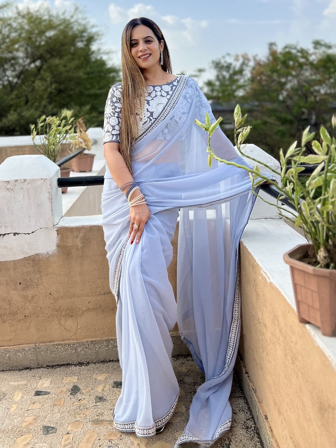 

Celeb Styles Embroidered Pure Georgette Saree, Grey