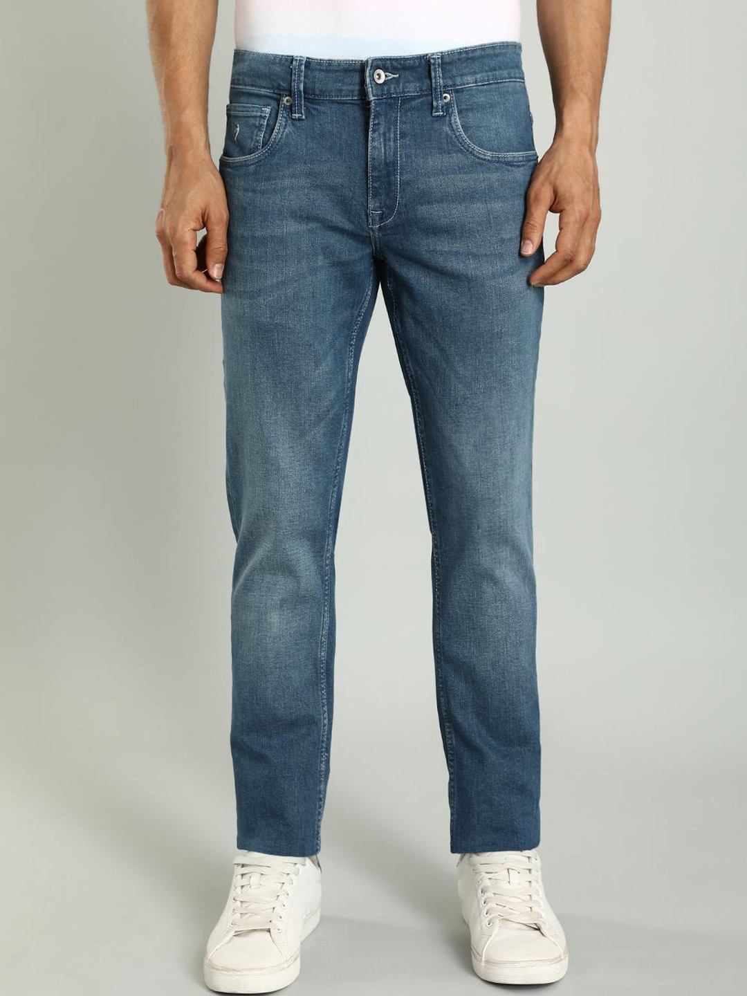 

Indian Terrain Men Kruger Tapered Fit Mid-Rise Light Fade Clean Look Stretchable Jeans, Blue