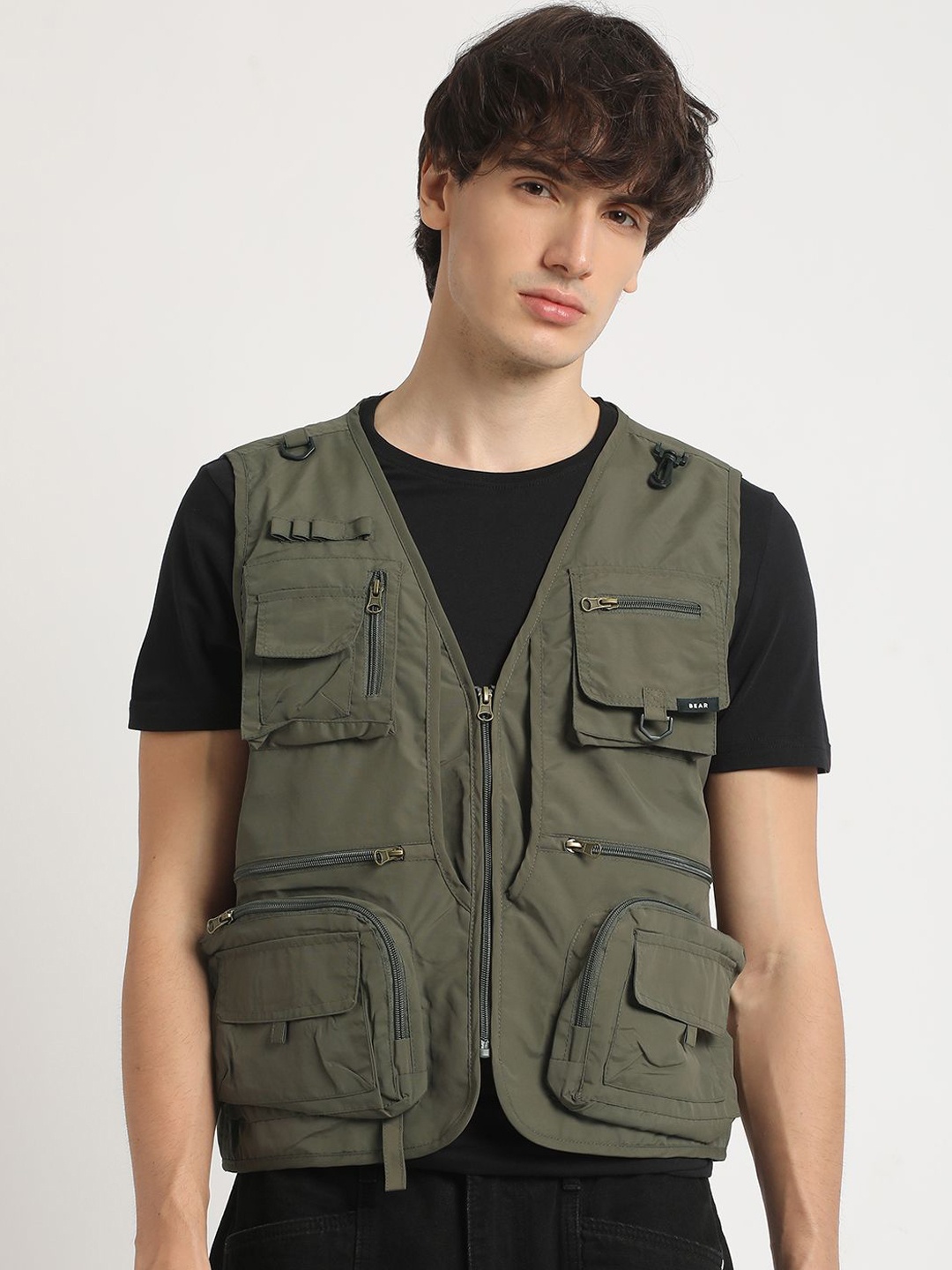 

THE BEAR HOUSE Sleeveless Collarless Tailored Jacket, Olive