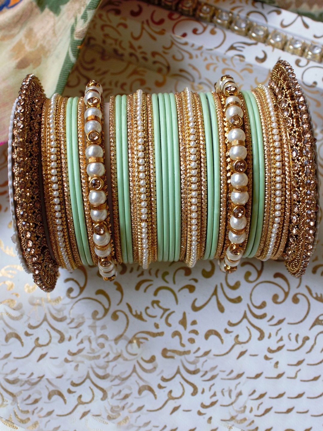 

leshya Set of 66 Brass-Plated Stone Studded & Beaded Bangles, Gold