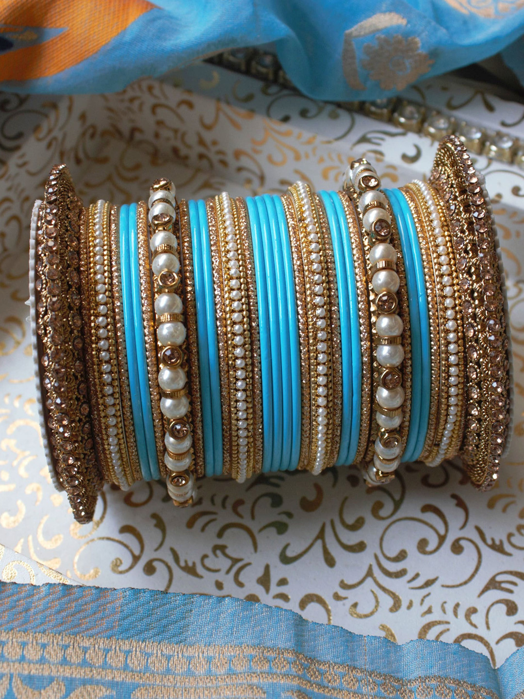 

leshya Set of 66 Brass Plated Artificial Stone Studded Bangles, Blue
