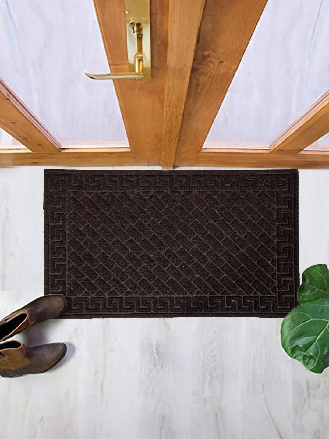 

Aura Coffee Brown & Black Self-Design Coir Anti-Skid Dirt Collecting Doormat
