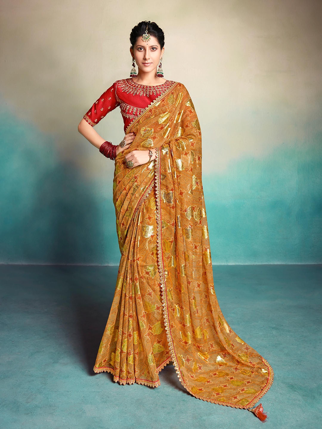 

ALAGINI Ethnic Motifs Embroidered Pure Georgette Saree, Mustard