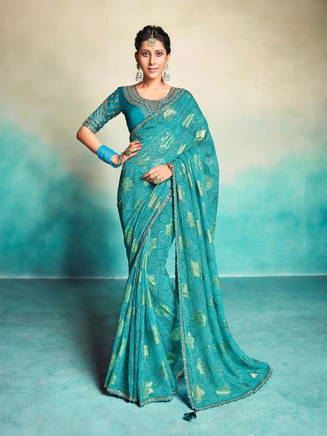

ALAGINI Ethnic Motifs Embroidered Pure Georgette Saree, Turquoise blue