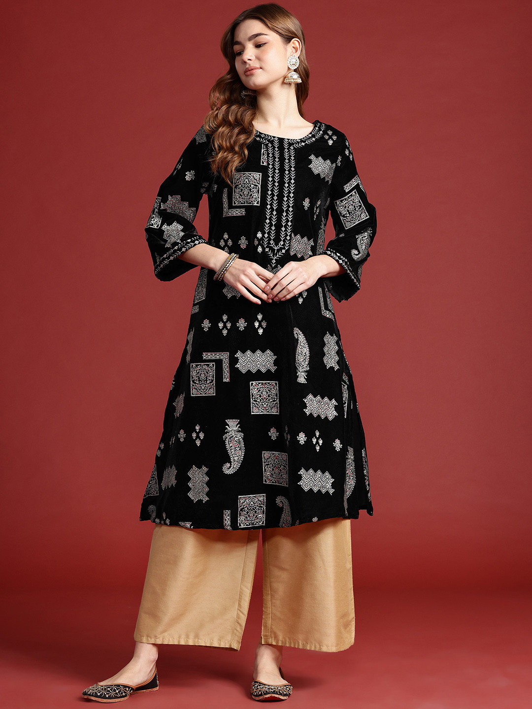 

Anouk Women Tyohar Collection Ethnic Motifs Printed Thread Work Velvet Finish A-Line Kurta, Black