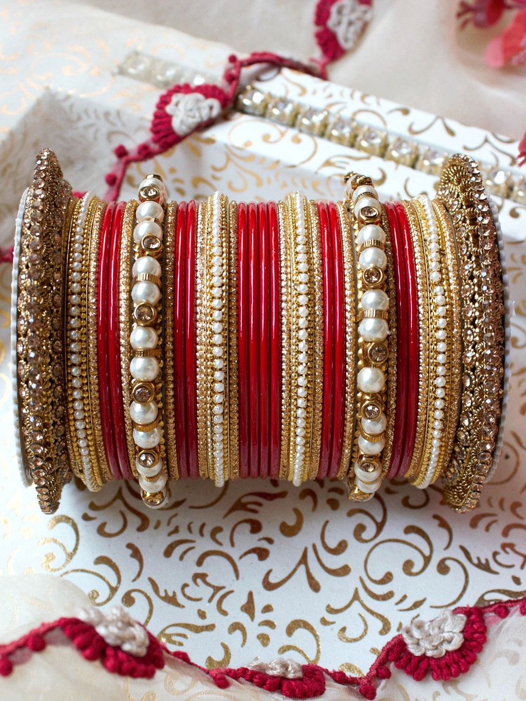 

leshya Set Of 66 Brass Plated Stone Studded & Beaded Bangles, Red