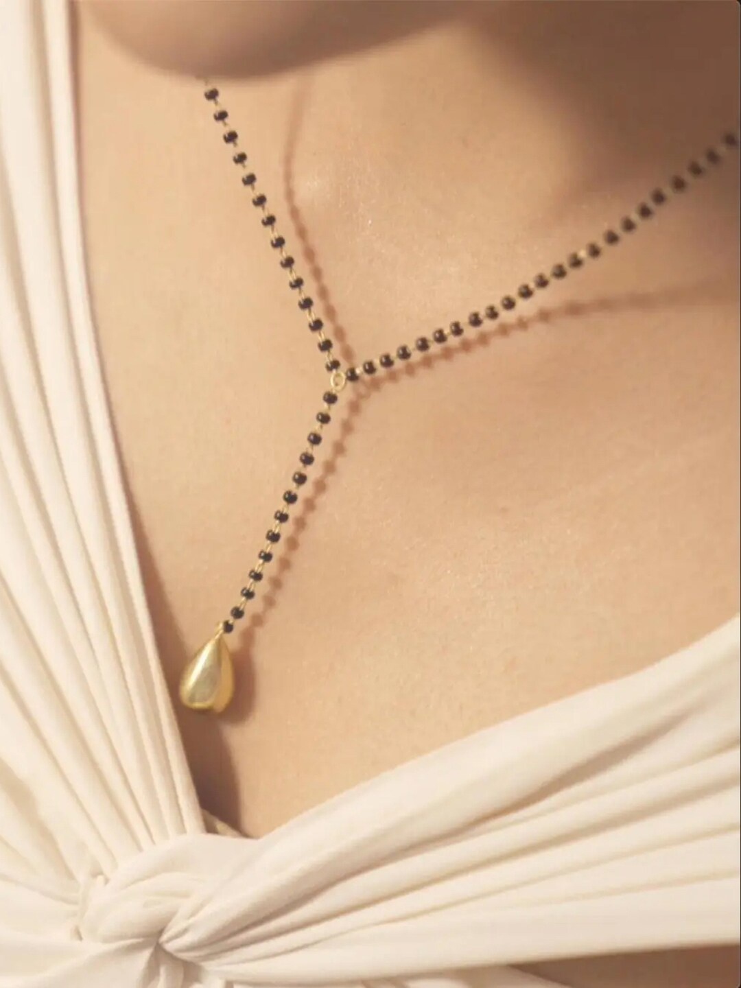 

Unniyarcha 92.5 Silver Gold Plated Artificial Beads Mangalsutra