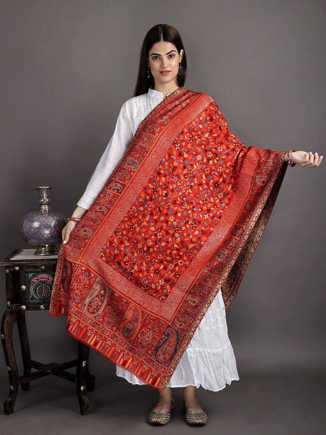 

Exotic India High Risk Red Woven Flowers Kani Jamawar Stole with Golden Border