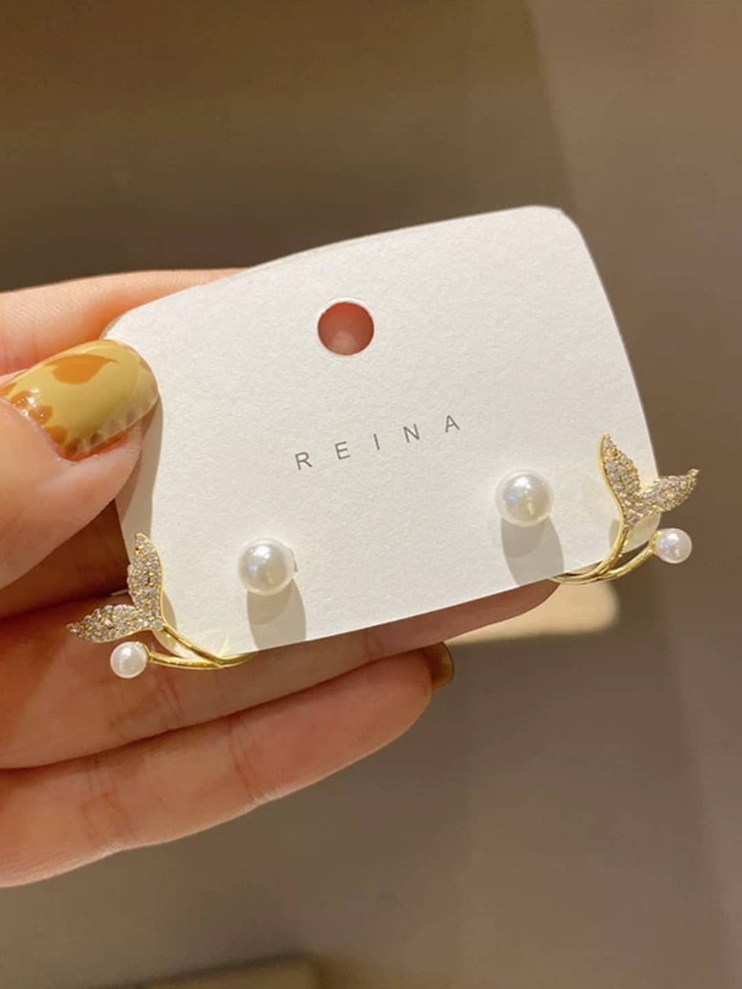 

YouBella Gold-Plated Pearl-Beaded Contemporary Studs Earrings