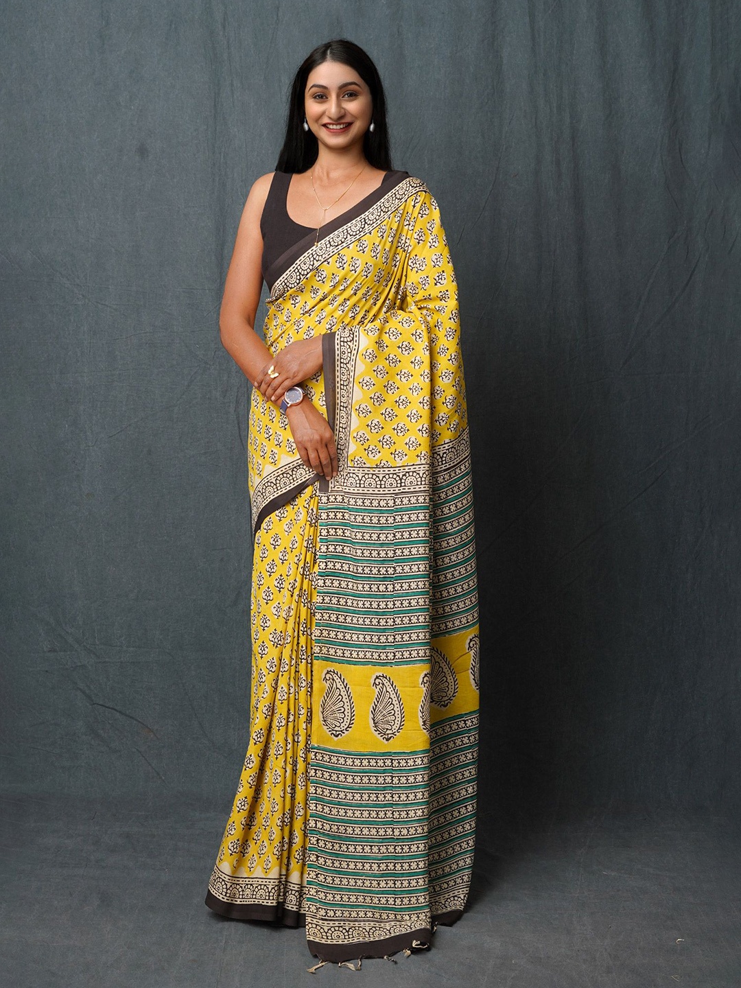

Unnati Silks Ethnic Motifs Pure Silk Handloom Bagru Saree, Yellow