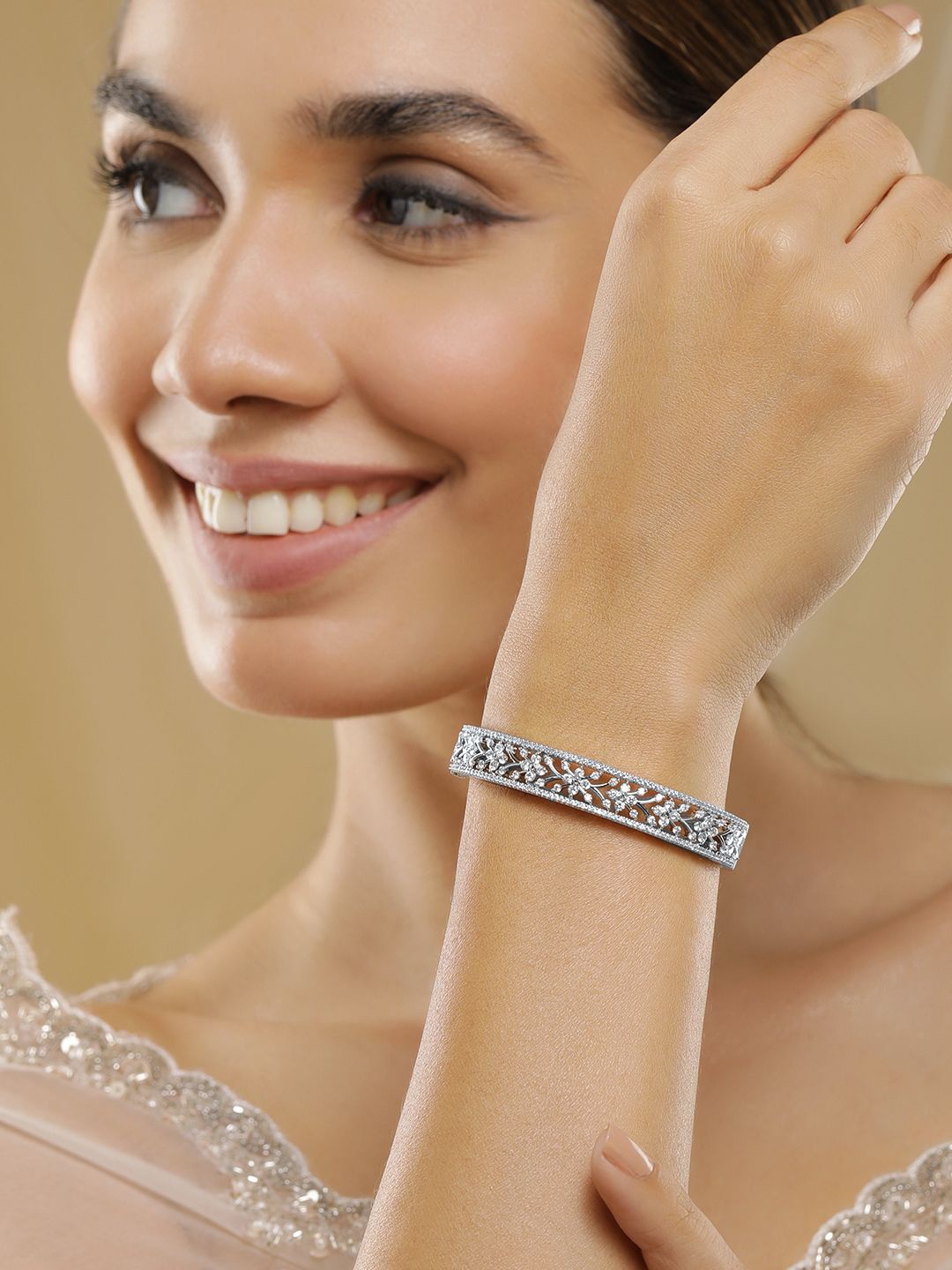 

Rubans Rhodium Plated Silver Tone Cubic Zirconia Studed Flower Design Bangle Style Bracelet