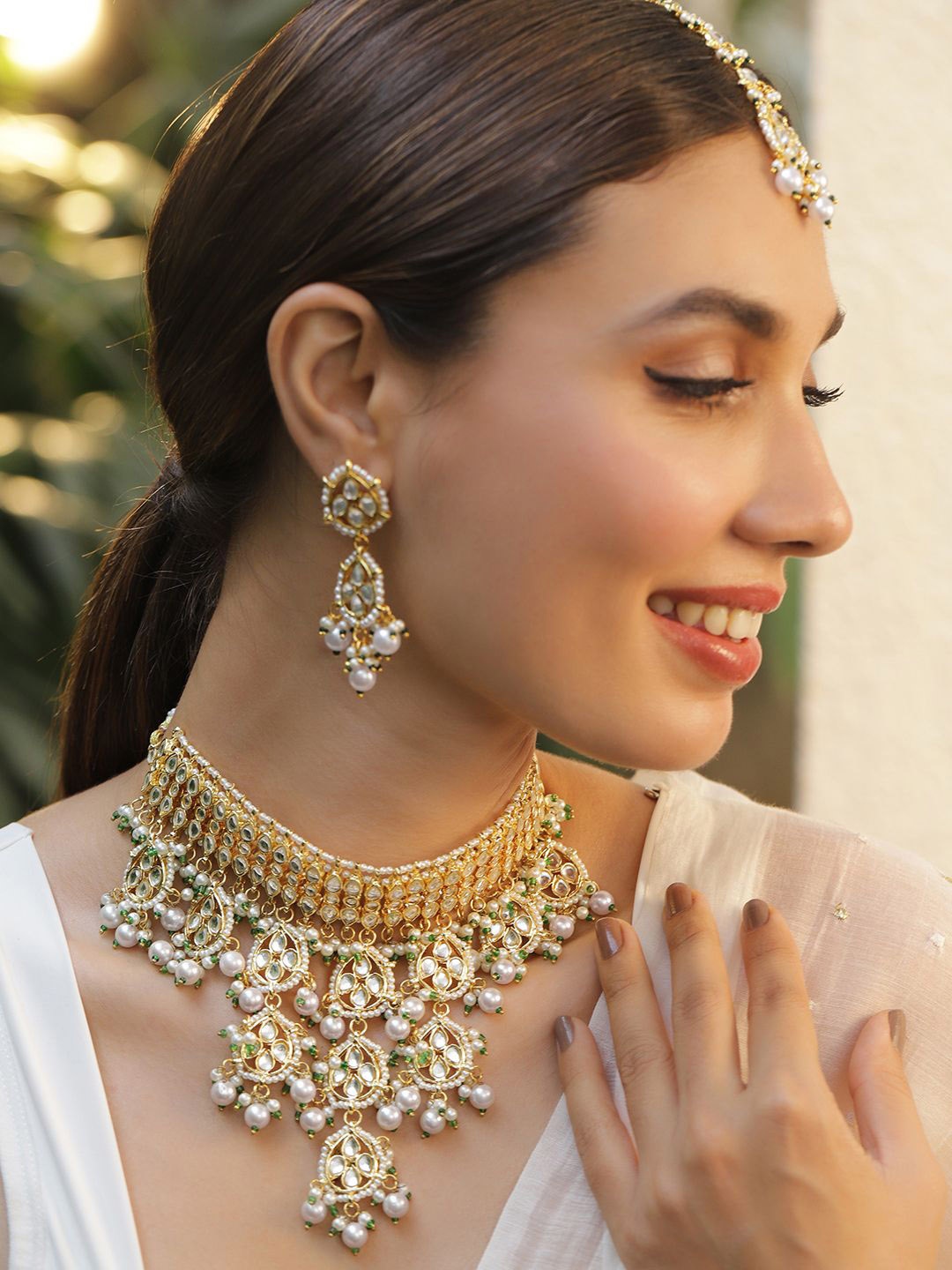 

Rubans Women 22KT Gold Plated Luxury Kundan Studded White Beaded Choker Necklace Set