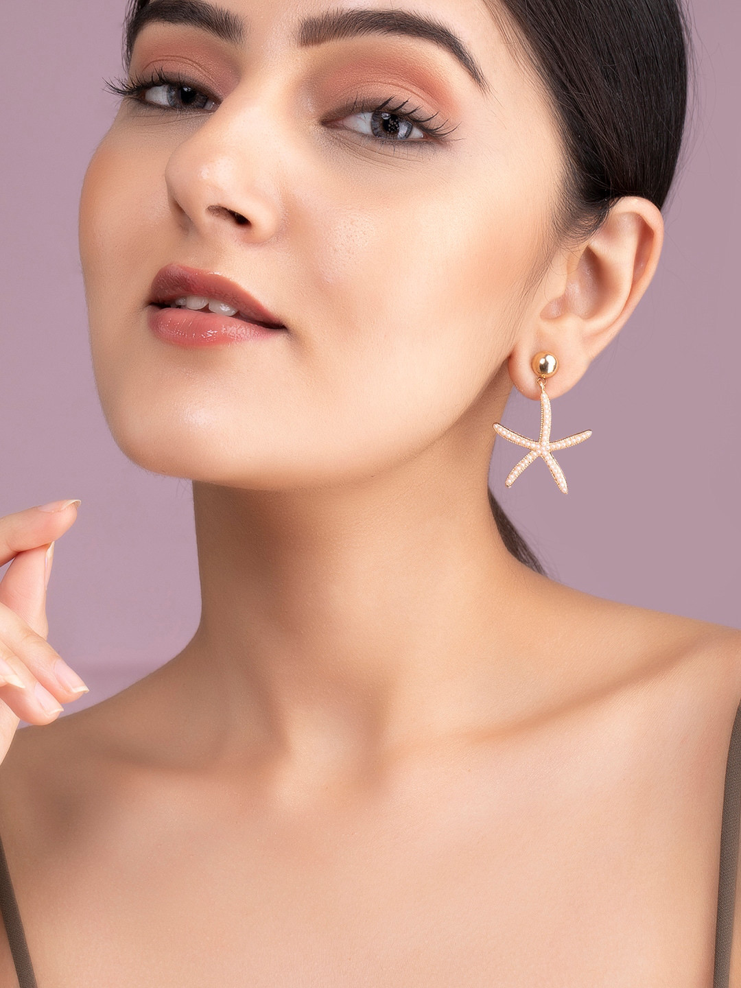 

Rubans Voguish 22KT Gold Plated Beaded Star Fish Shaped Drop Earrings