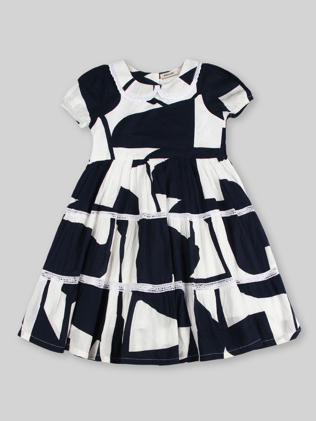 

INCLUD Girls Abstract Printed Peter Pan Collar Puff Sleeves Tiered Fit & Flare Dress, White