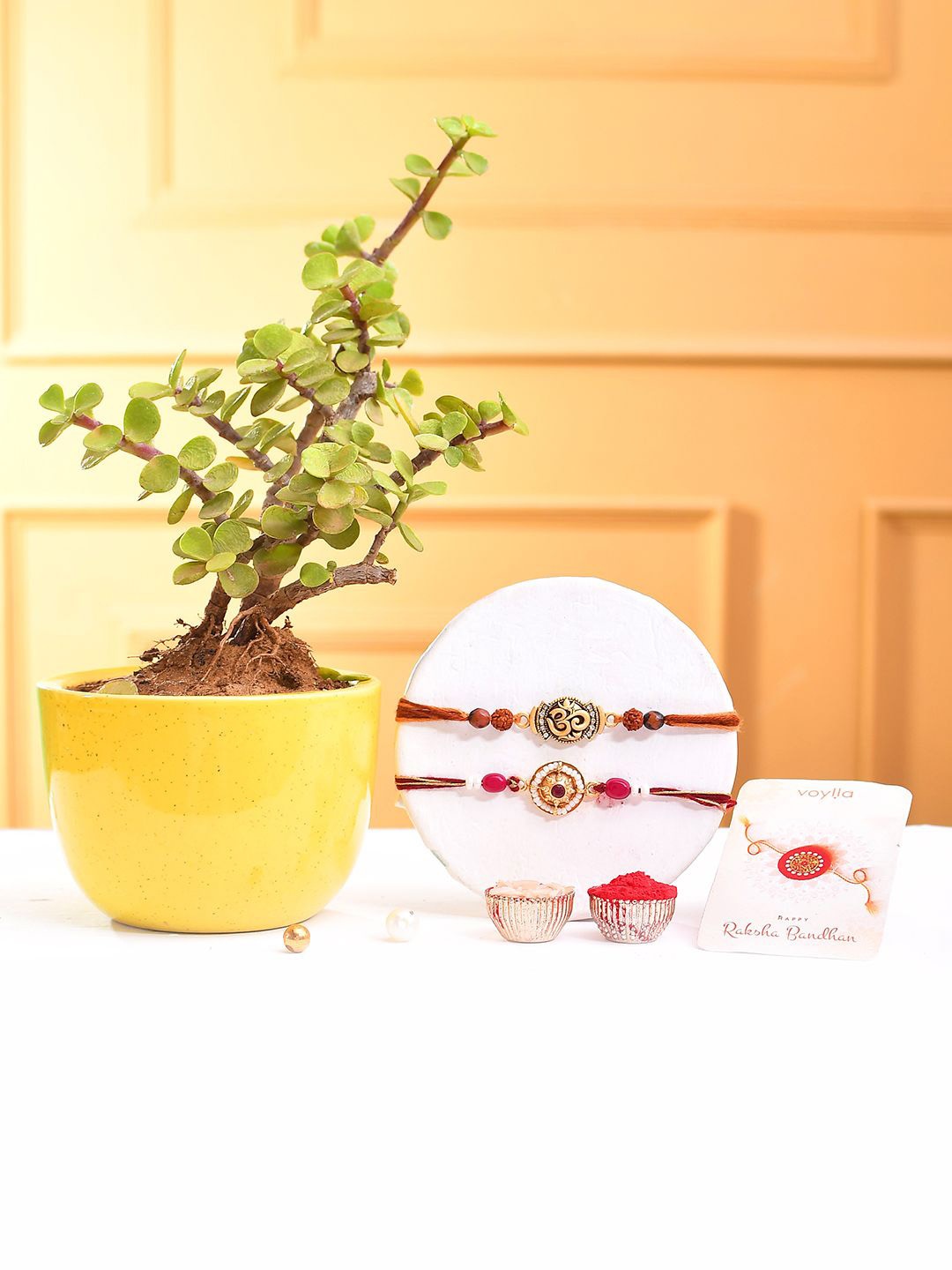 

Voylla Pack Of 2 Traditional & Divine Motifs Thread Rakhis With Jade Plant, Yellow