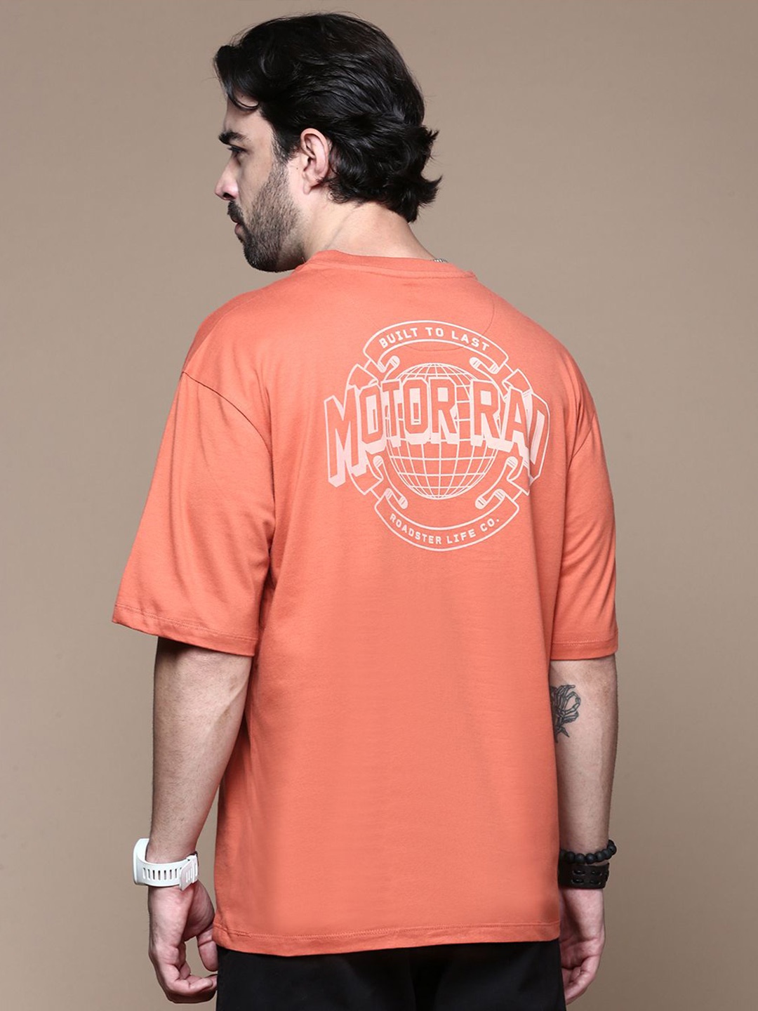

The Roadster Lifestyle Co. Men Graphic Printed Round Neck Cotton T-shirt, Rust