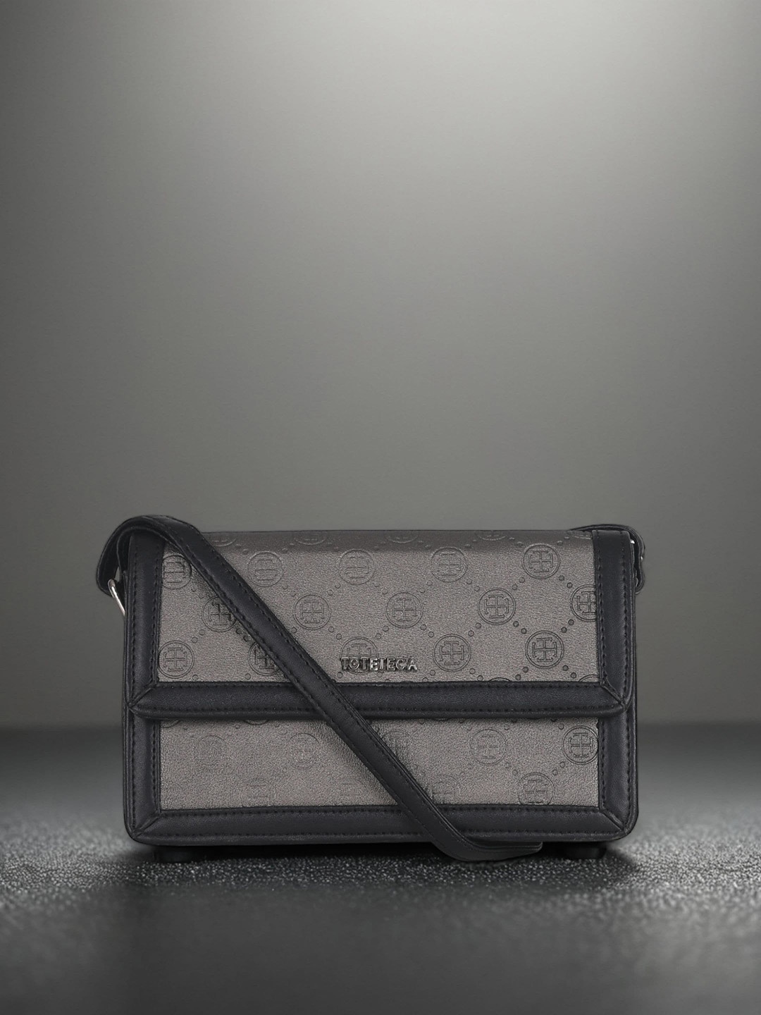 

Toteteca Women PU Structured Sling Bag, Silver