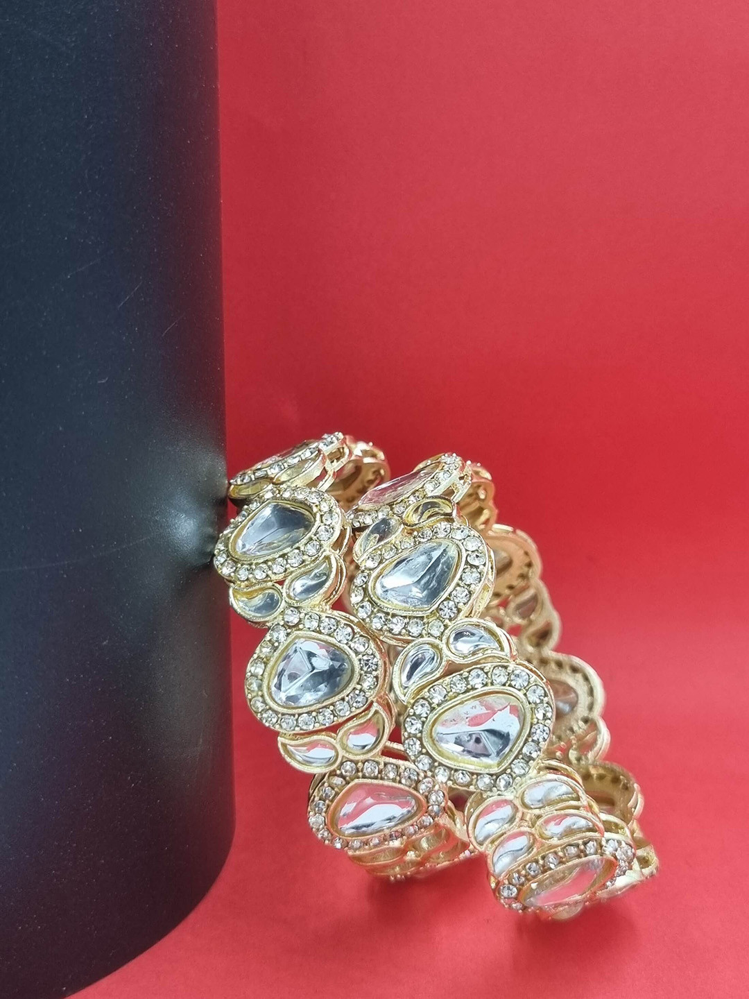 

Anouk Gold Toned Set of 2 Gold Plated Kundan Studded Bangles