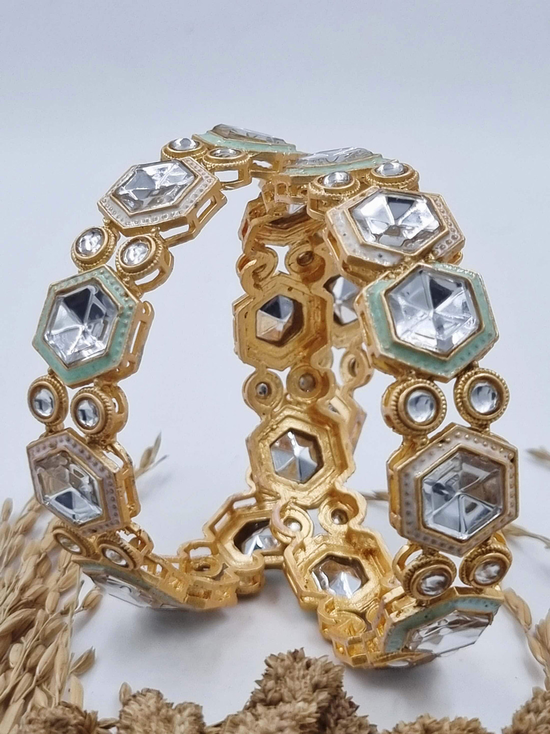 

Anouk Gold Toned Set of 2 Gold Plated Artificial Stones Studded Bangles