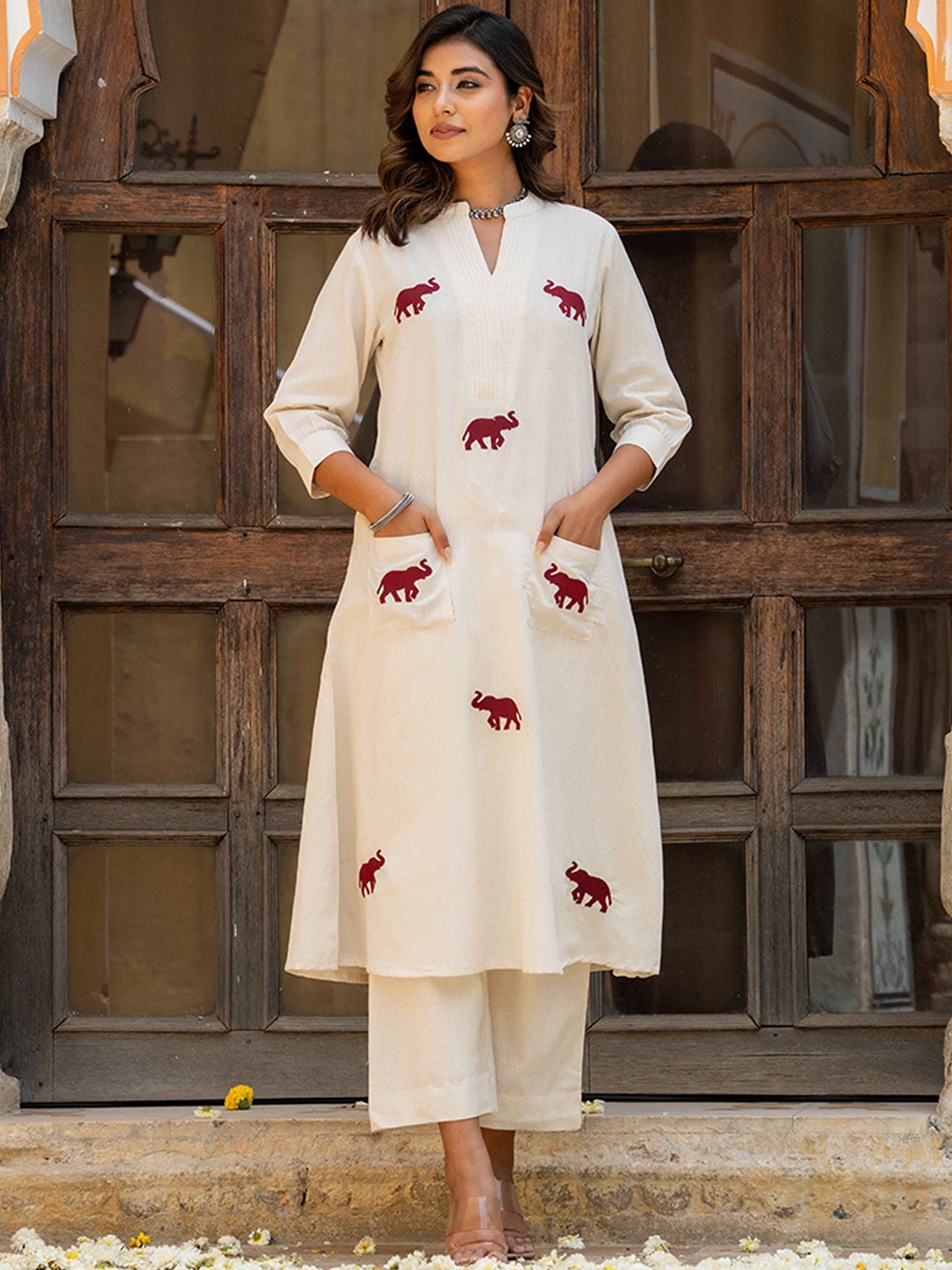 

KALINI Women Animal Embroidered Regular Pure Cotton Kurta with Palazzos, Cream