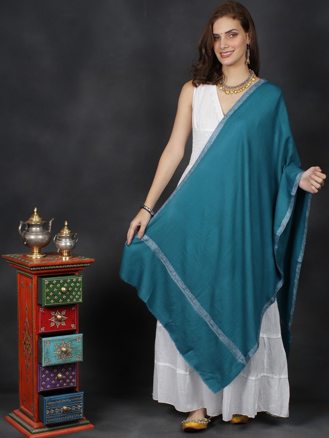 

Exotic India Teal Diamond Weaved Pure Wool Stole with Neem Dar Sozni Hand Embroidery