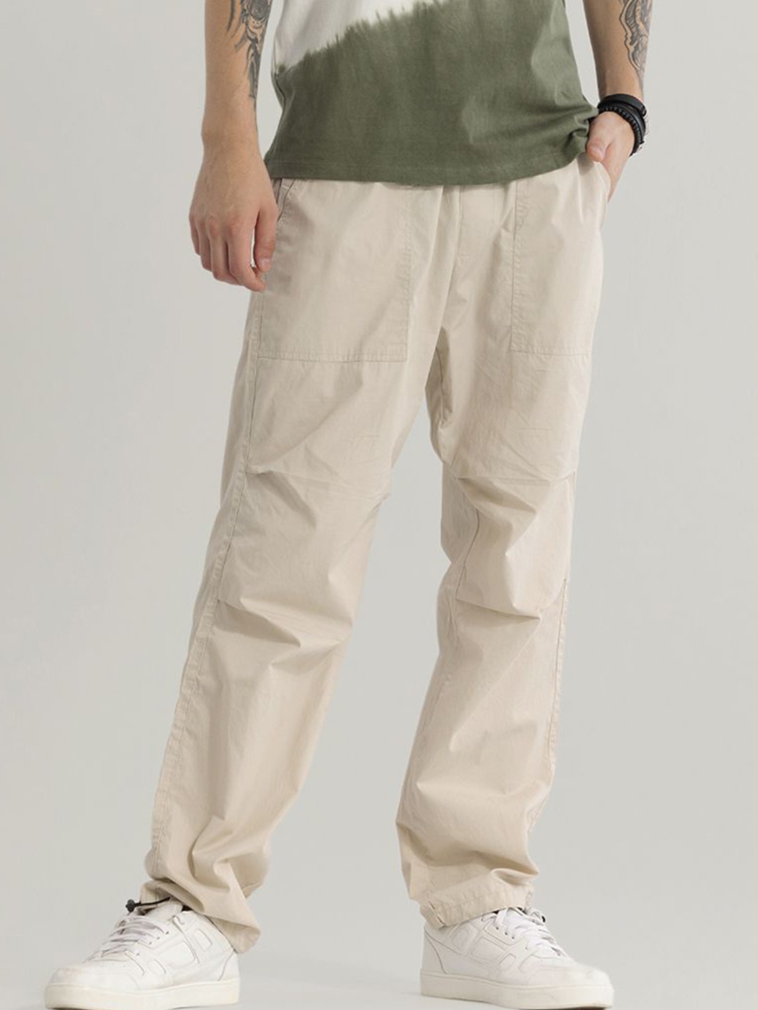 

Snitch Men Solid Pure Cotton Loose-Fit Joggers, Beige