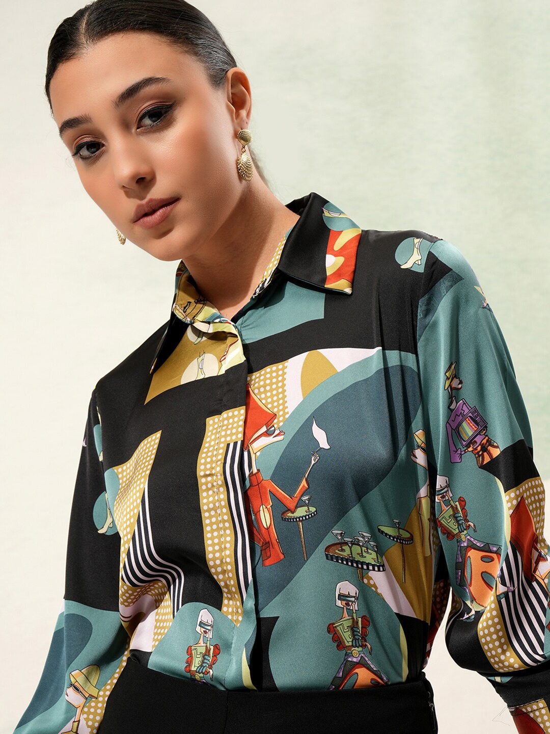 

Tokyo Talkies Women Printed Satin Casual Shirt, Black