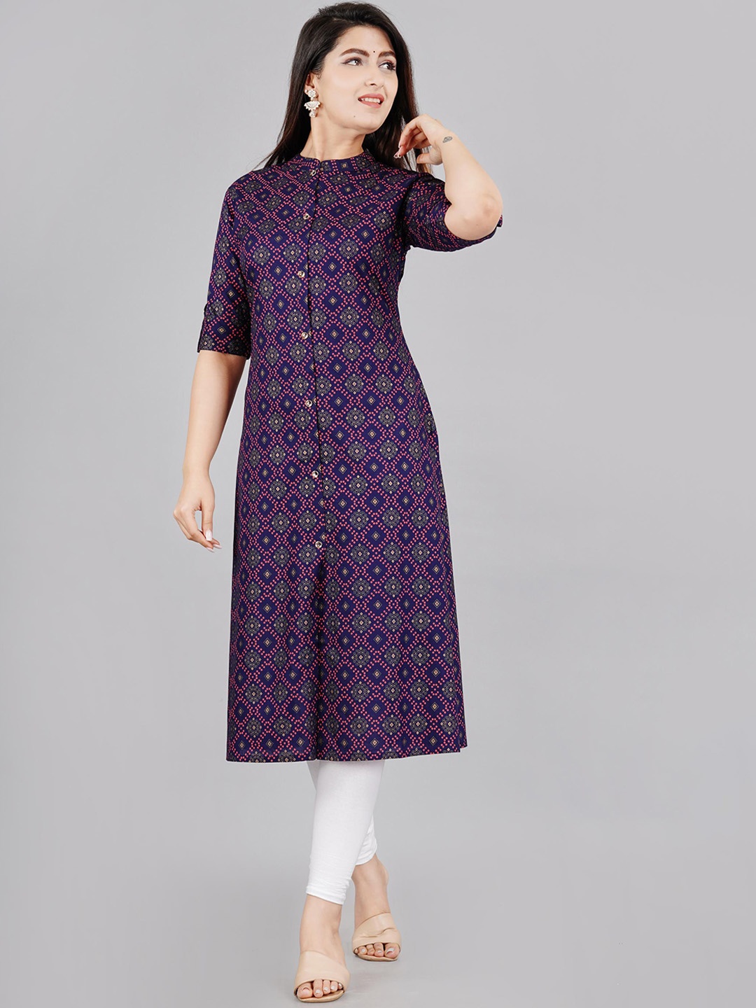 

Mintmarie Women Abstract Printed Thread Work Asymmetric Kurta, Navy blue