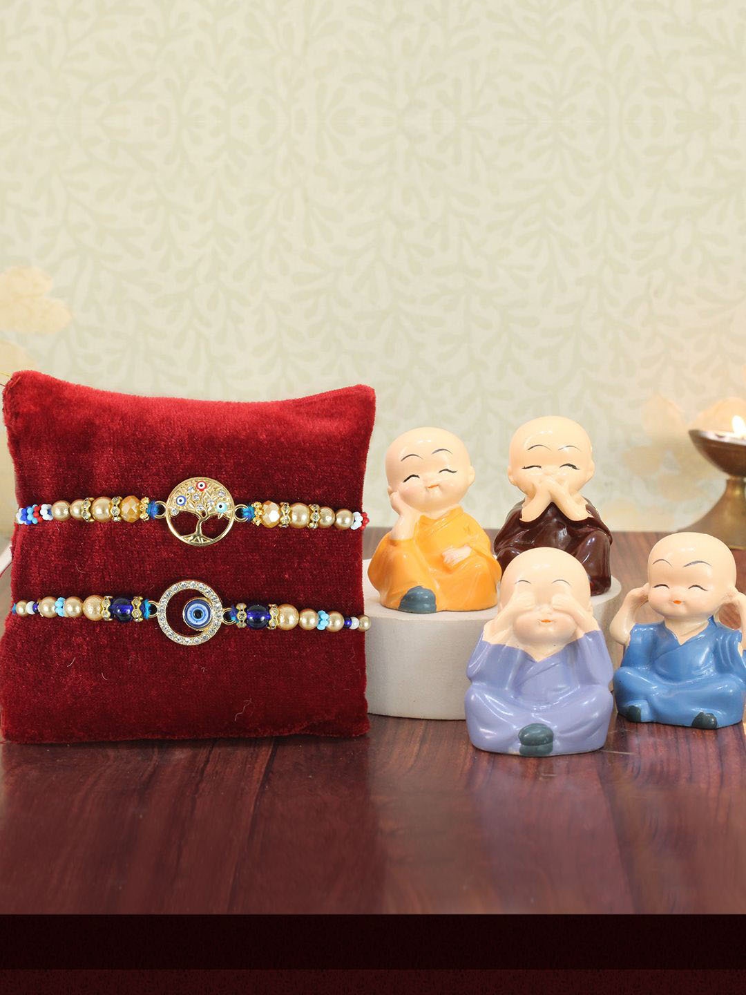 

TIED RIBBONS Set Of 2 Evil Eye Rakhi & Mini Buddha Idol Card Rakhi Gift Set, Blue