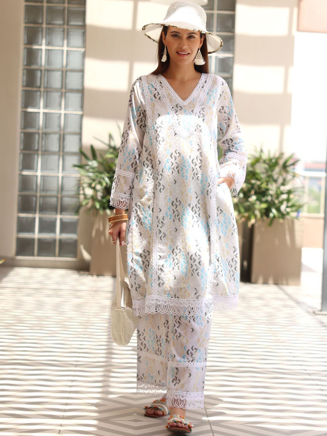 

Libas Women Printed Regular Chikankari Kurta With Palazzos, Off white