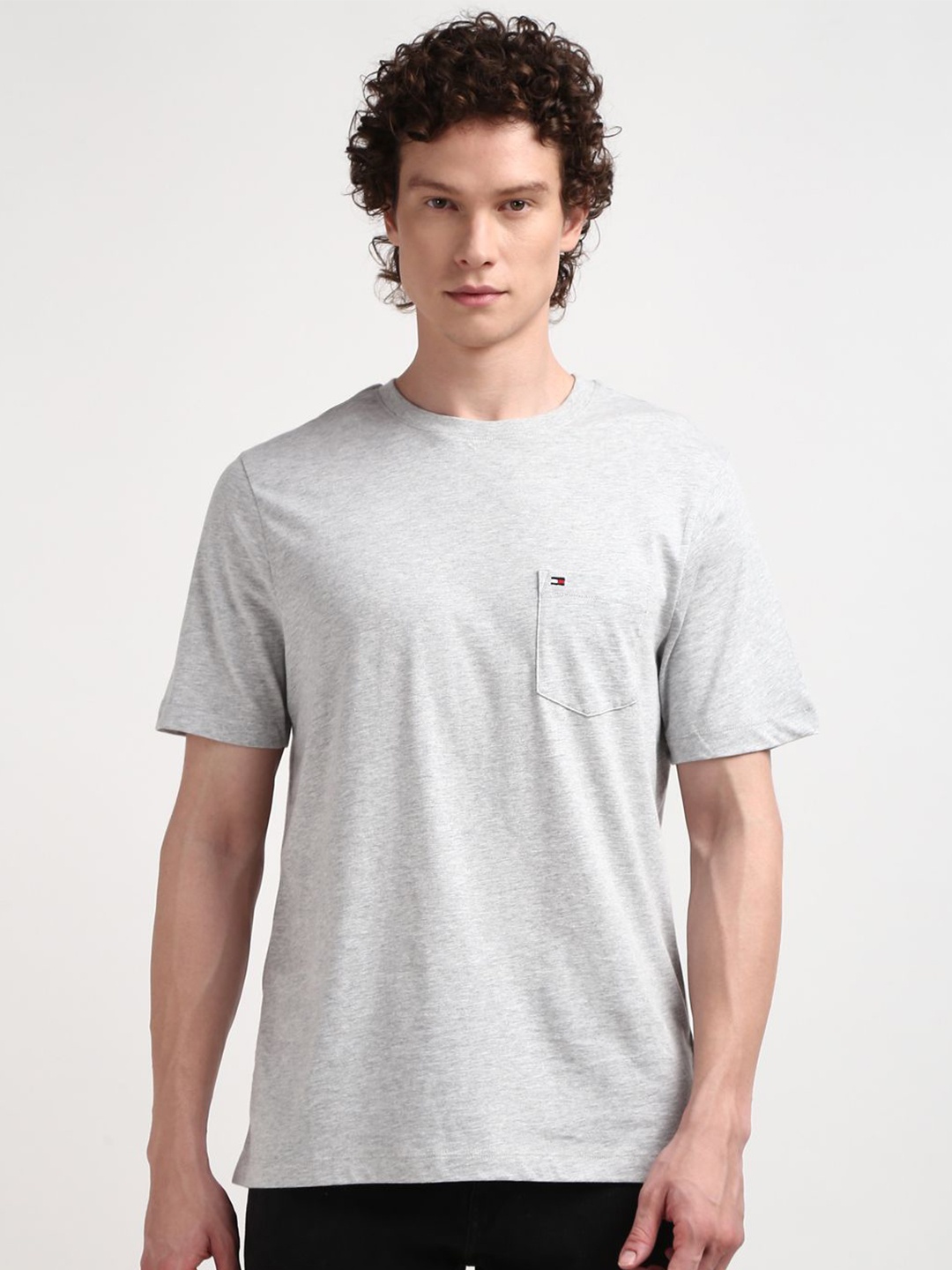 

Tommy Hilfiger Men Solid Round Neck Pockets T-shirt, Grey