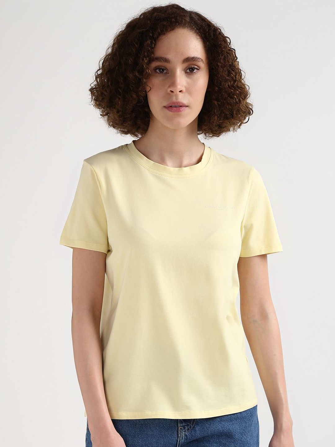 

Tommy Hilfiger Women Solid Round Neck T-shirt, Yellow
