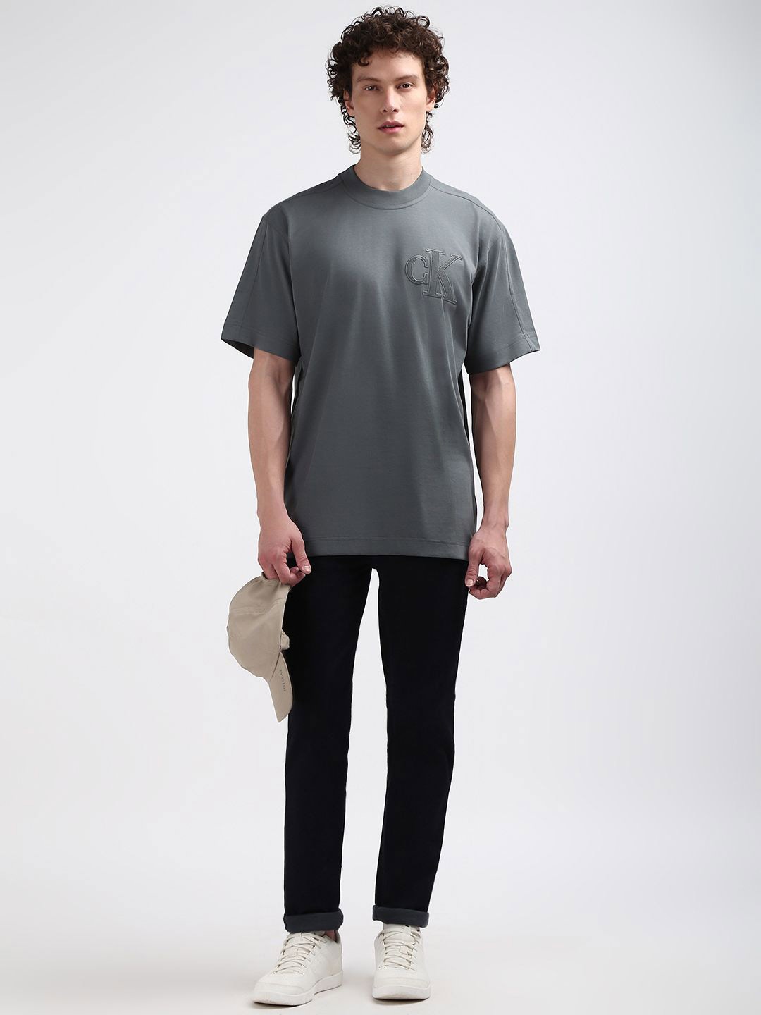 

Calvin Klein Jeans Men Round Neck Solid T-shirt, Grey