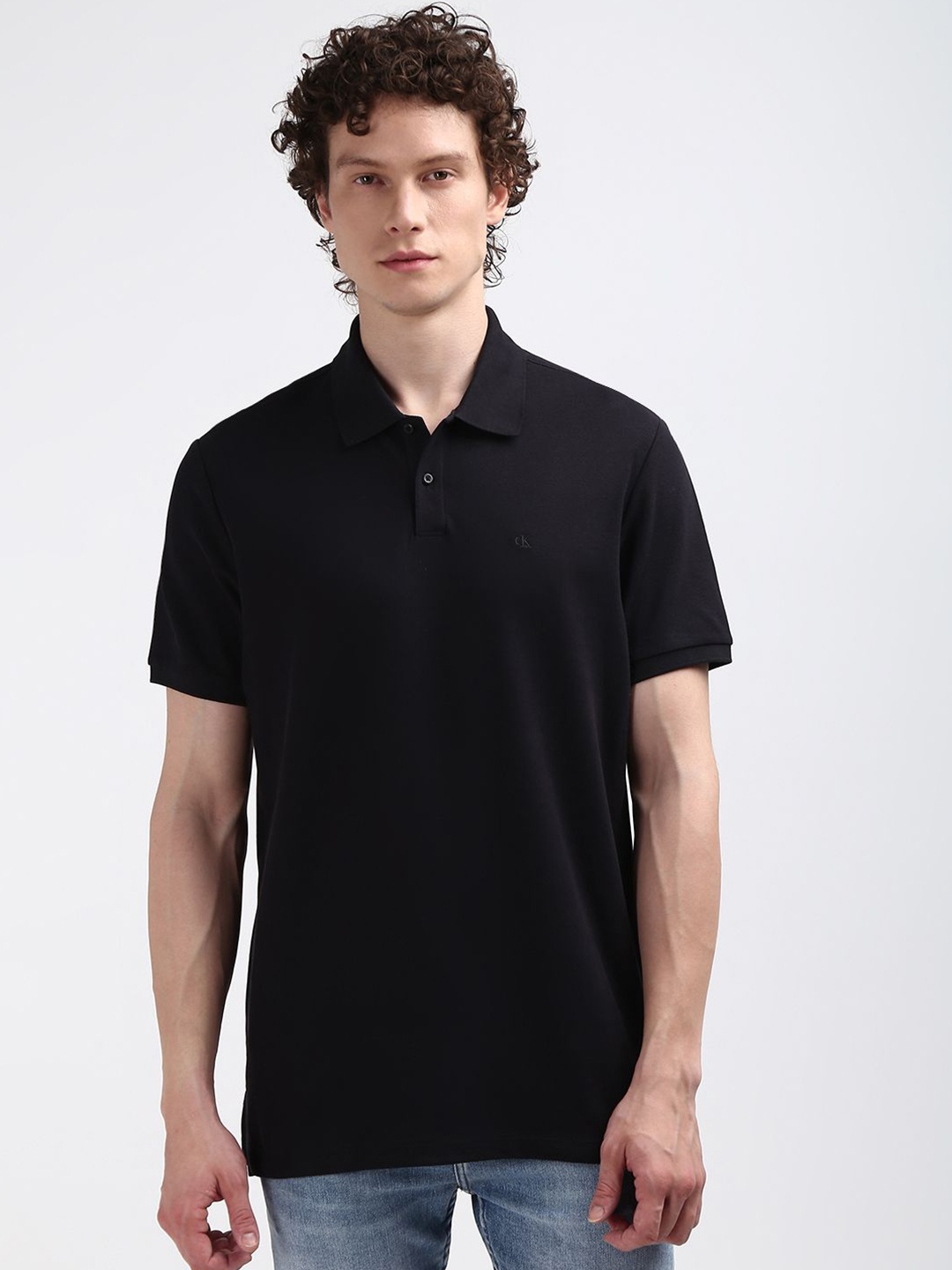 

Calvin Klein Jeans Men Polo Collar Solid T-shirt, Black