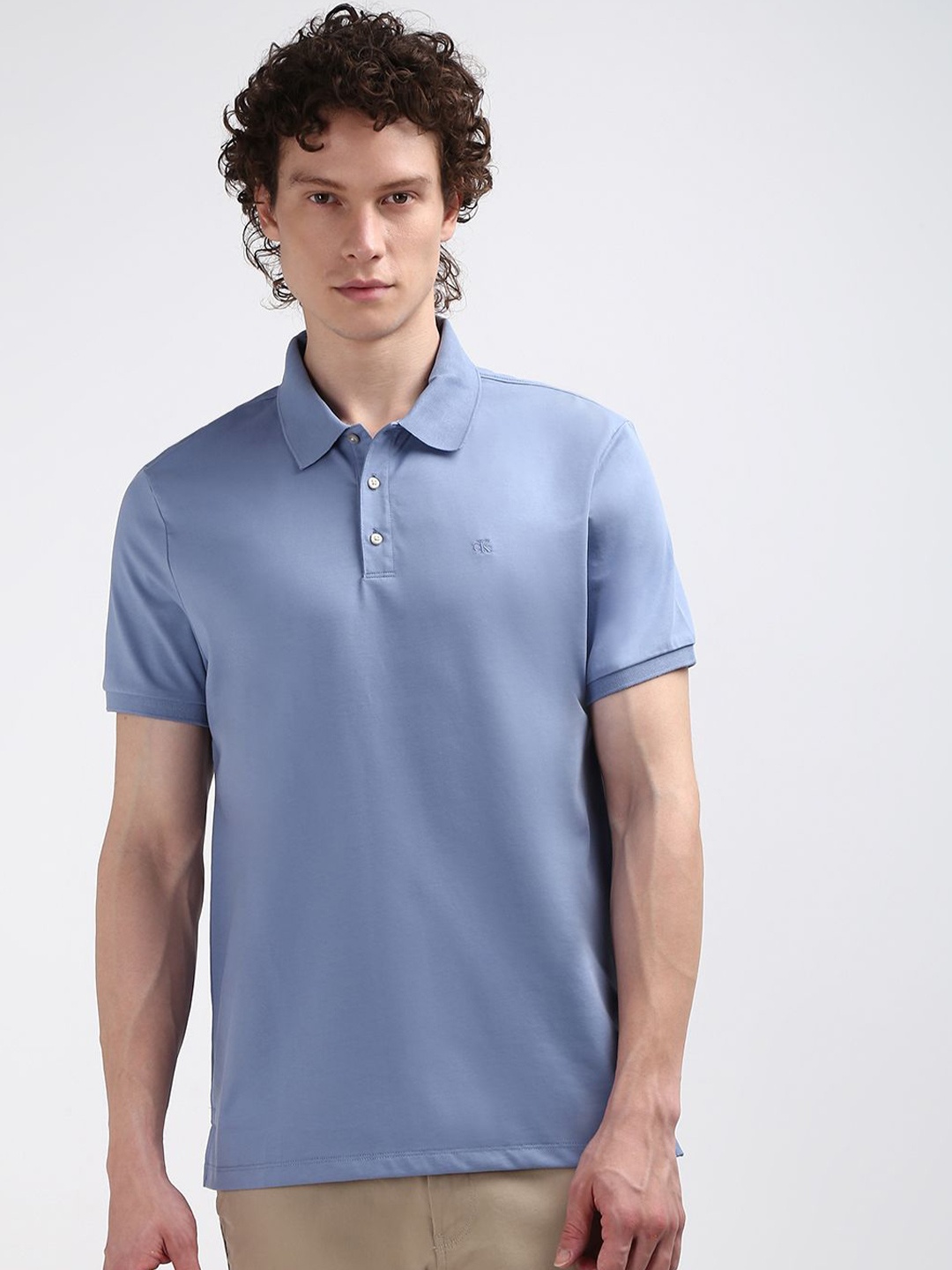 

Calvin Klein Jeans Men Polo Collar Solid T-shirt, Blue