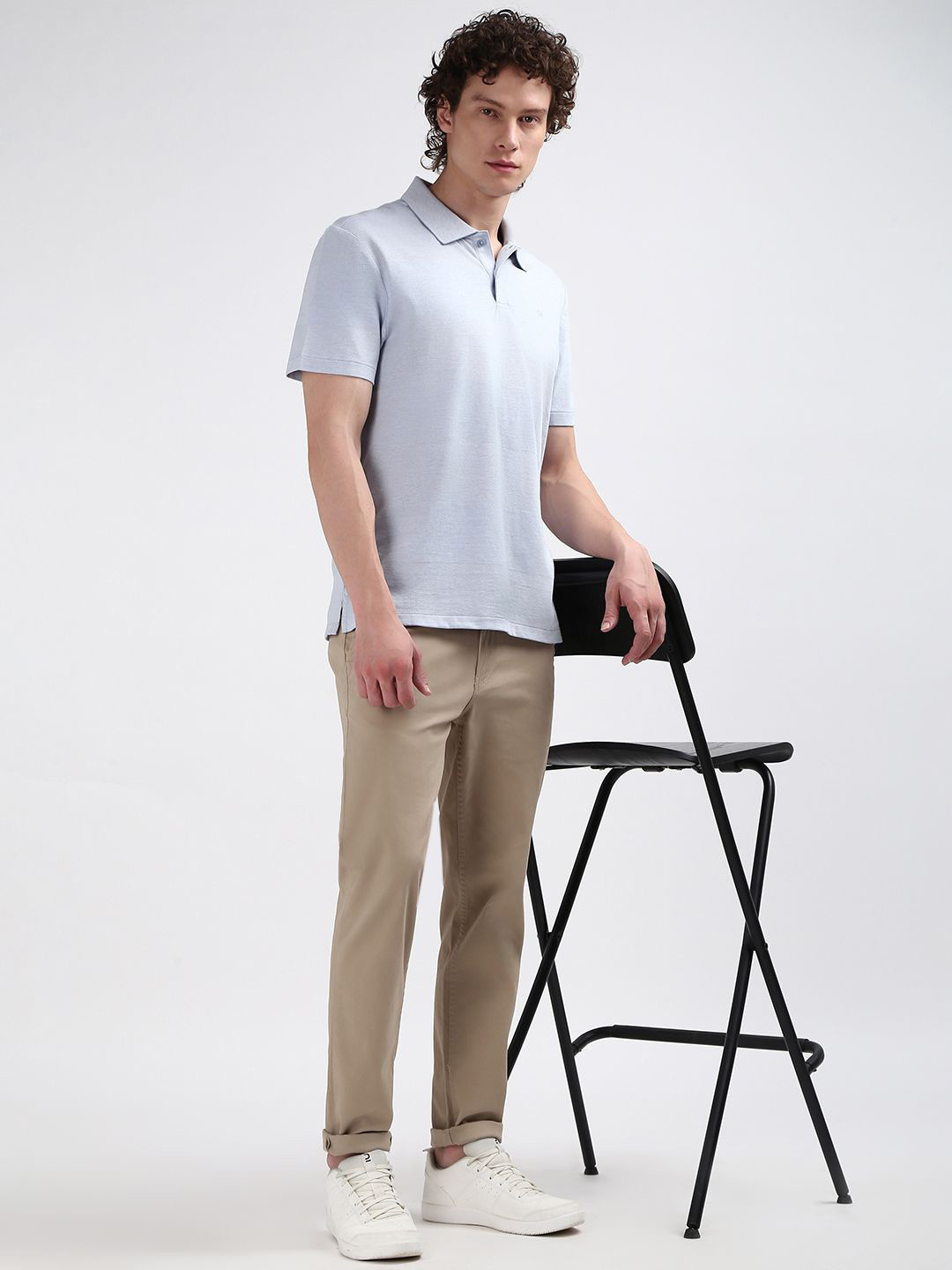 

Calvin Klein Jeans Men Polo Collar Solid T-shirt, Blue