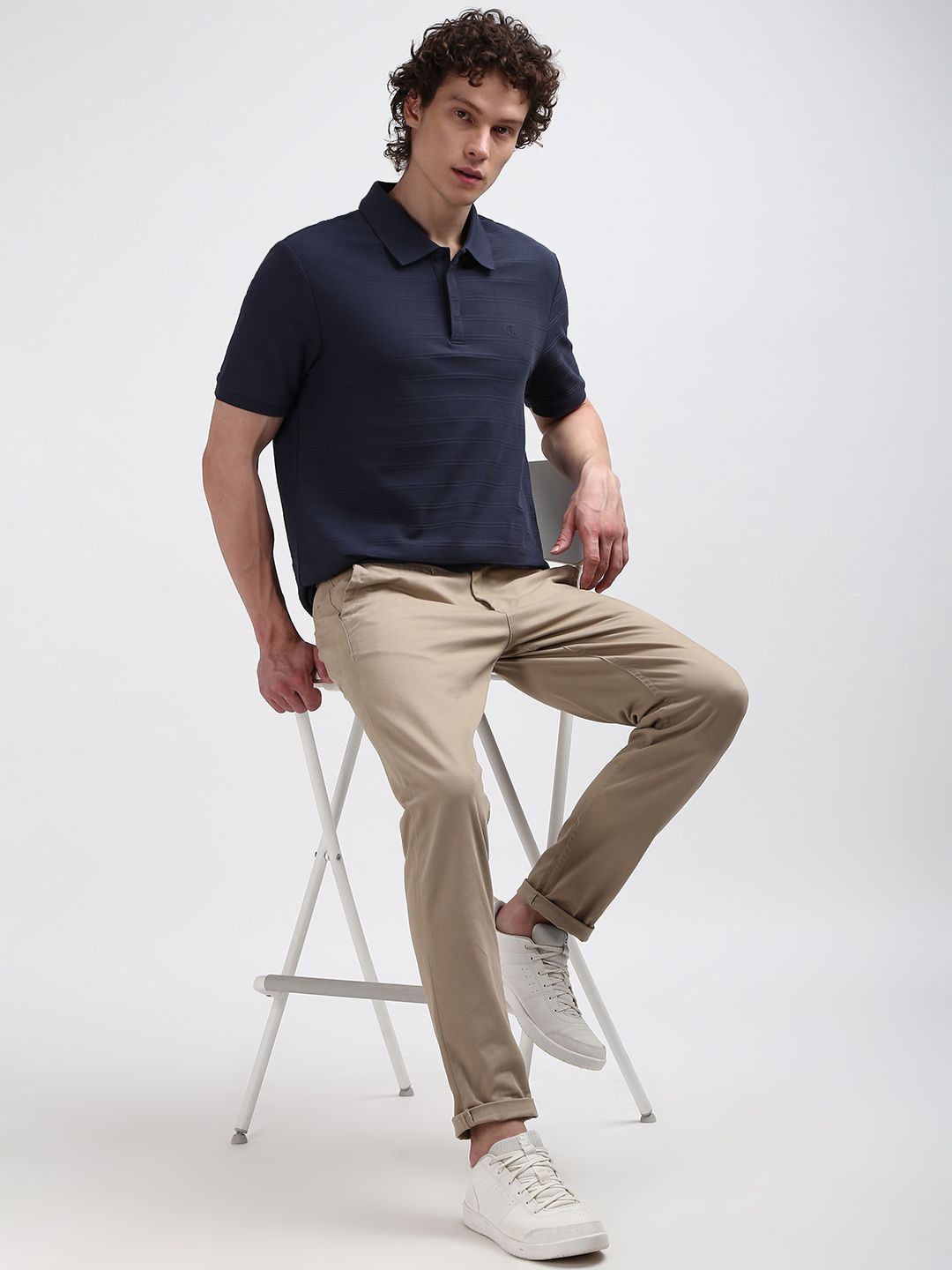 

Calvin Klein Jeans Men Polo Collar Solid T-shirt, Blue