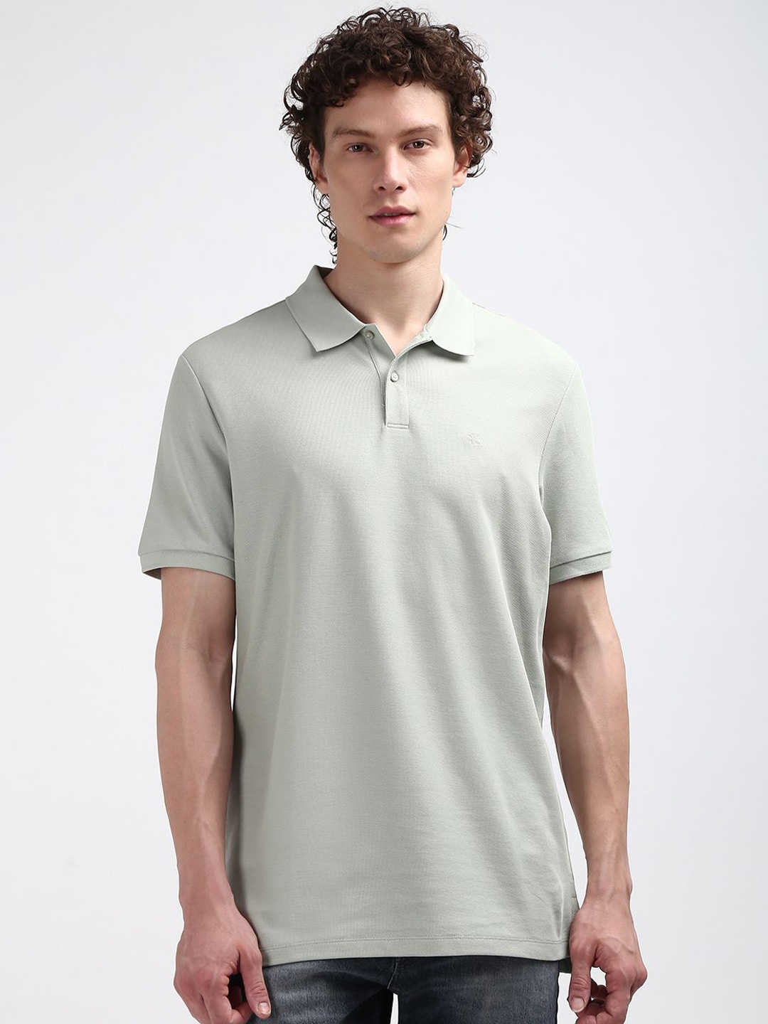 

Calvin Klein Jeans Men Polo Collar Solid T-shirt, Green