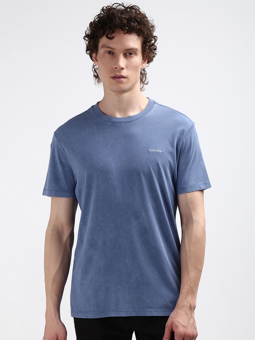 

Calvin Klein Jeans Men Round Neck Solid Pure Cotton T-shirt, Blue