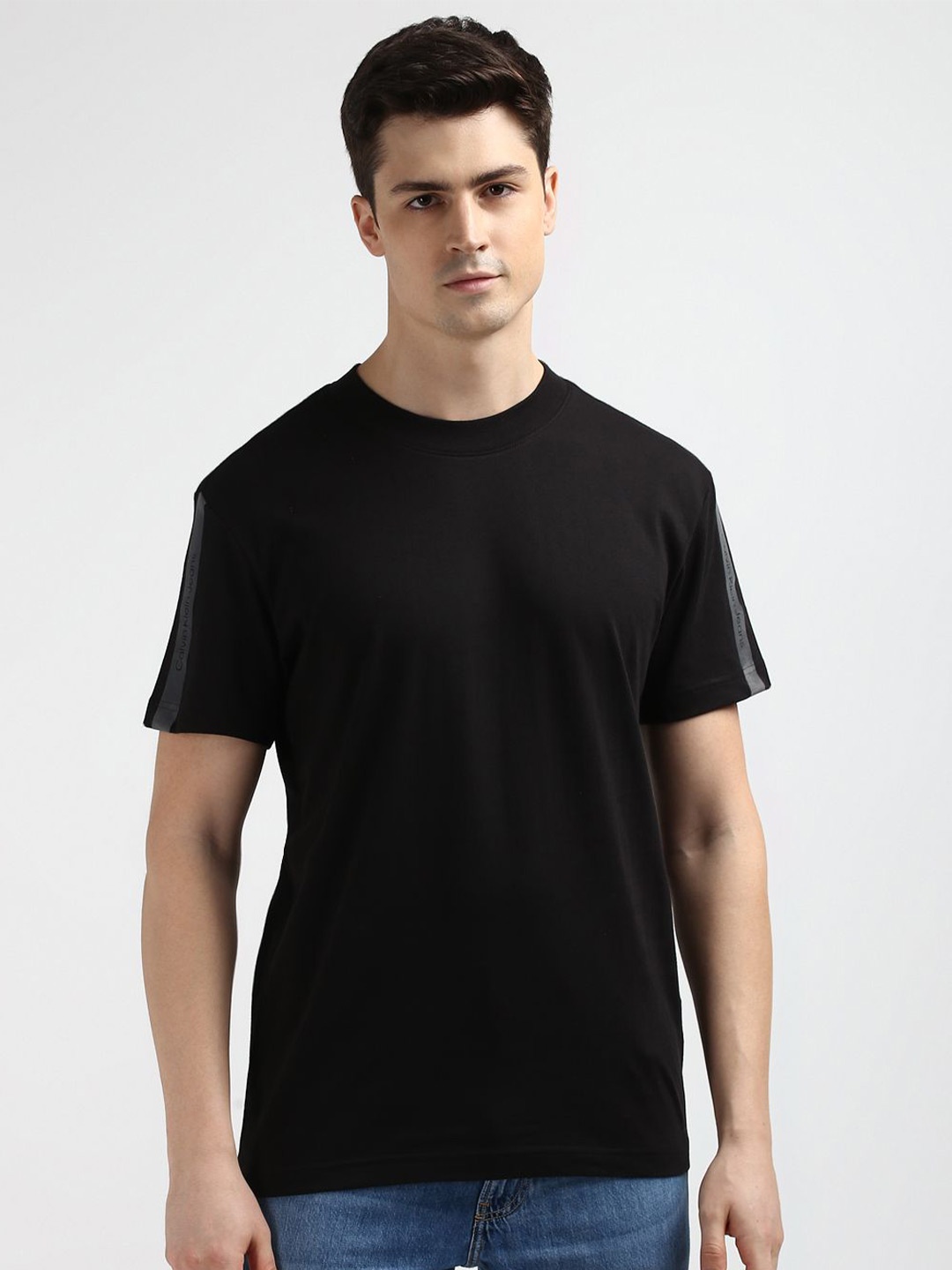 

Calvin Klein Men Round Neck Solid T-shirt, Black